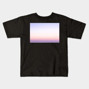 Abstract sunrise over water Kids T-Shirt